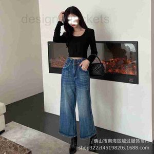 Kvinnors jeans designer tidigt på våren ny show matchar dubbel hög midja lösa smala breda benbyxor denim kvinnor trmp