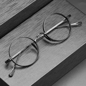 Lyxdesigner högkvalitativa solglasögon 20% rabatt på tiotusen år sköldpadda manlig ultralätt Pure Titanium Oval Optical Glasses Frame Female Shenzhen