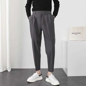 Calça masculina moda masculina calça casual cintura elástica pés pequenos pés magros estilo coreano plissado cônico calças machos calças de streetwear w0325