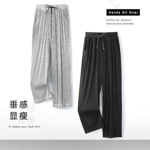 Pantaloni da uomo Pantaloni estivi di seta sciolti di ghiaccio Drappo da uomo Pantaloni lunghi da 100 kg Pantaloni sportivi casuali grassi Pantaloni larghi a gamba larga Tide Marca W0325