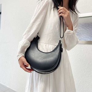 nxy sadel axel sidosäckar för kvinnor trend vinter designer handväskor och plånböcker designer sadel crossbody väskor 230308
