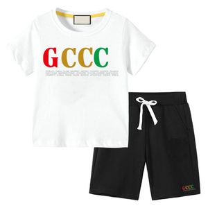 2-7 Yıl Çocuklar Tasarımcı Giyim Setleri yaz % 100% pamuk en kaliteli T-Shirt Pantolon Set Marka logosu baskı Çocuk 2 Parça Giyim bebek Erkek kız Moda Appare G009