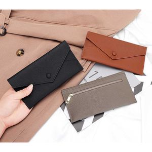 Plånböcker 100% äkta läderkvinnor Lång plånbok Luxury Solid Money Slim Clutch Bag For Ladies Fashion Cowhide ID Holder Purse G230327