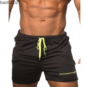 Herrshorts Gymnorth Men Shorts 2020 JOGGERS Sweatpants Casual Fast Torking Black Summer Mesh Short Pants W0327