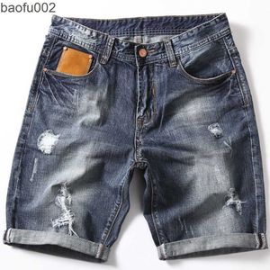 Men's Shorts 2023 Summer New Men's Denim Shorts Fashion Slim Fit Elastic Cotton Blue Wash Ripped Jeans Male Brand Clothes 42 W0327