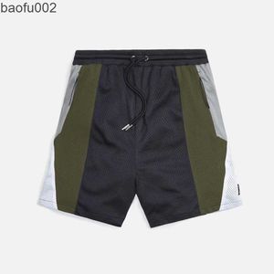 Pantaloncini da uomo Estate Uomo New Mesh Traspirante Palestre Fitness Esercizio Jogging Sport Pantaloni larghi a 3 punti Cuciture moda Pantaloncini da spiaggia W0327