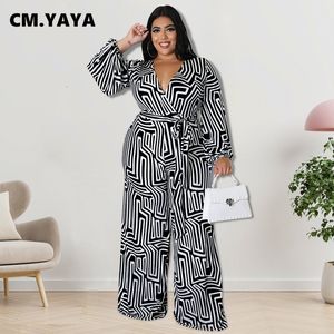 Women's Plus Size Jumpsuits Rompers CM.YAYA Plus Size Women Black Rompers Long Sleeve Vneck Jumpsuit Street Party Set Overall Sashes Print Playsuit 230325