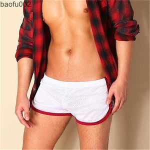 Shorts masculinos largam os shorts shorts shorts flecunts masculinos shorts esportivos ginásios de boxers soltos respiráveis ​​calças casuais curtas verão w0327