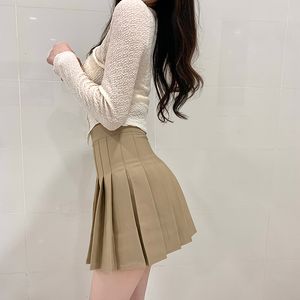 Spódnice Kobiety Platana spódnica z wysokim talią Fall Krótkie ubrania Vintage Khaki A-line koreańskie preppy styl czarne dziewczyny kawaii mini spódnice 230327