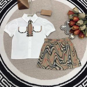23ss t shirt Skirt suit kid sets designer skirt Round neck Pure cotton Wear a lapel shirt with a patchwork tie shirts Plaid stitching pleated skirt suits kids clothes a1