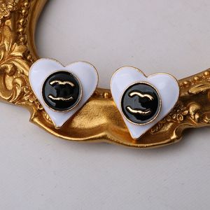 23SS 2. styl luksusowy projektanci marki Listy Ear Stud Black White Heart 18K Gold Splated 925 Srebrne geometryczne kobiety koło metalowe kolczyki