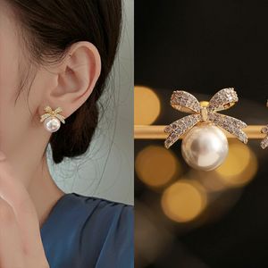 Ny Crystal Zircon Love Heart Stud örhängen för kvinnor Elegant imitation Pearl Bow Dangle Earring Bridal Wedding Luxury SMYELLT