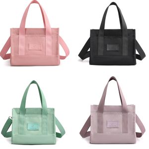 Dhl50pcs messenger väskor kvinnor nylon vanlig stor kapacitet personlig sport liten klaff handväska mix färg