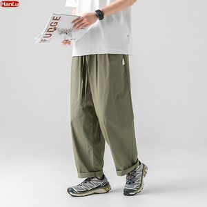 Męskie spodnie 2023 Wiosenne lato szerokie na męską bawełnianą zieloną zieloną harem mody projekt workowate joggery dresowe