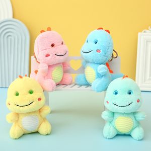 Cartoon Lächeln Baby Dinosaurier Plüschtier Schlüsselanhänger Puppe Anhänger Rucksack Anhänger Persönlichkeit Puppe Stoffpuppe