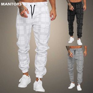 Herrbyxor 2022 Nya jogger Men's Casual Pants Plaid byxor Fashion Streetwear Men's Cargo Pants Fitness Gym Sweatpants Herrkläder W0325