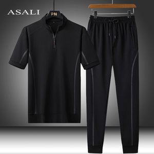 Tute da uomo Tuta Pantaloni coreani Abbigliamento 2023 Estate Seta di ghiaccio Casual a maniche corte Uomo di grandi dimensioni Allentato in due pezzi Sottile Sport 230428