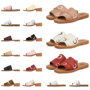 Designer Wooden Women Sandália Mula feminina Floras de pele planas sandálias de cunha Summer Summer Straw Straw Spelides Sponge Cake Mueller Slippers Women Women Women Women Women