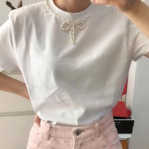 T-shirt Nuovo marchio di moda Collana di perle con decorazione a fiocco di perline maglietta bianca 2020 nuove top estive da donna