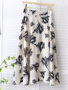 Kjolar kvinnor blommor tryck chiffong lång kjol sommar stilig midiskirt ett stycke kontor damer wrap semester sexig strand