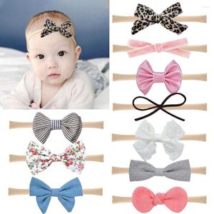 ヘアアクセサリー20pc/lot bady girls nylon headband幼児ヒョウ弓幼児ティアラギフト包帯ドットボウ