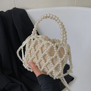 Abendtaschen Nische Allgleiches hochwertiges Strand-hohles gewebtes Perlen-Acryl-Material Mode-Abendessen-tägliche Crossbody-Taschen für Frauen 230504