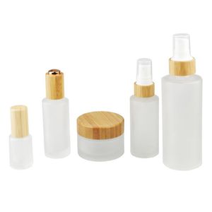 2023 Bottiglie di stoccaggio Barattoli 30ml 50ml 100ML 120ML 150ML Pompe trasparenti glassate Top Bottiglia di lozione di bambù 1oz 2oz 4oz Frost Glass Mist Spray