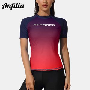 Wetsuits Drysuits ANFILIA Women Short Sleeve Rash Guard Shirts Badkläder Rash Guard Top Surf Top Closebiting Shirt Upf 50 J230505
