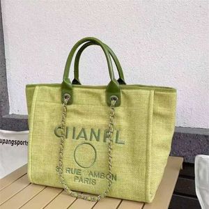 Brancas de luxo de luxo Bolsas de praia bordadas para mulheres bolsas de lona noturna clássica feminina grande compra de grande capacidade para fábricas de fábrica de fábrica 70% de desconto em sp2l