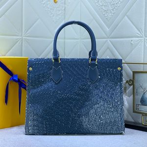 Denim tygväska kvinnor vintage väskor blå svart axel handväskor butikspåsar strandväska handväska medelhög handväska duk äkta läder klassisk bokstäver stor kapacitet