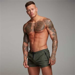 Menas de banho masculina 2021 Tunha de banho de verão de verão Turncos de natação sexy para homens boxer boxer curto mass de natação shorts praia shorts surf boardshorts sunga homens p230506