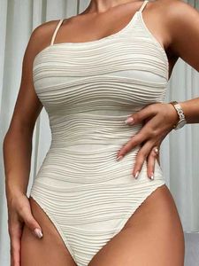 Kvinnors badkläder 2023 Sexig Beige Strapped SwimeWear Women Solid High Cut Push Up One Piece Swimsuit Monokini Backless New Brazilian Bathing Suit J230506