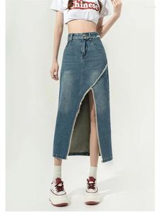 Spódnice wysokiej talii średniej długości nieregularna podzielona dżinsowa spódnica damska letnia prosta ulica prosta dodatki