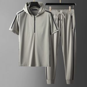 Erkek Trailsits Minglu kapüşonlu spor sıradan erkekler setleri tişörtler yaz kısa kollu kauçuk baskılı erkek takım elbise elastik bel adam pantolon 5xl 230506
