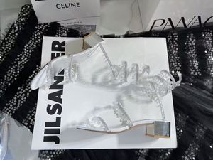 Luksusowy design Irina Crystal Sandals Buty Kobiety sztylet pięta brokat podeszwy lady kryształ wąż owinięte letnie obcasy impreza dressam ślubny gladiator sandalias