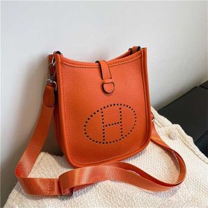 50% off factory online Texture Women's Bag 2023 New Family Small Mini Fashion Square Personalized One Shoulder Crossbody Hollow out Bucket