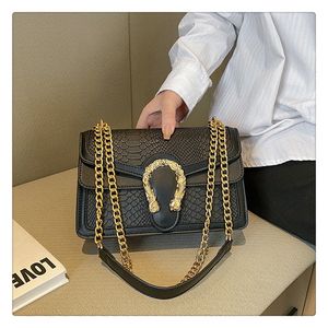 2023 Nya ankomstkedjor för damer Snakesskin Purse Leather Fashion Designer Handväskor för kvinnor Lyxig axelväska