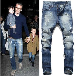 Jeans masculinos Novo moda Beckham Hole rasgou Hip Hop Men Slim Jeans Troushers Button Fly lavado