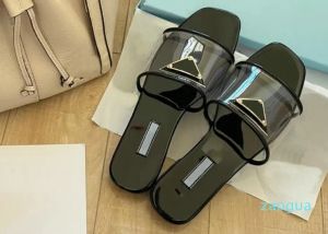 2023 Nya modekvinnor tofflor Sandles Flat Home PVC Transparent toffel badrum blommor geraniumtryck sandaler skor flip flops lyx sandales sommar glider