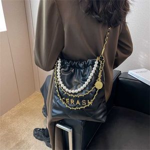 celebridade Tiktok corrente de diamante pequena fragrância sacola de compras feminina nova moda mensageiro designer bolsa venda on-line