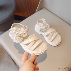 Sandaler flickor barnskor 2023 sommar ny mode mjuk prinsessa öppen tå barn avslappnad solid färg enkla sandaler med pärlor