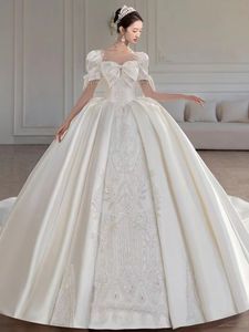Elegancka suknia balowa sukienki ślubne suknie ślubne cekinowa z koralikami kryształowa satynowa sukienka panny młodej vestidos de novia vintage koronkowa szyja w kształcie śladowej szkiełki ślubne sukienki ślubne