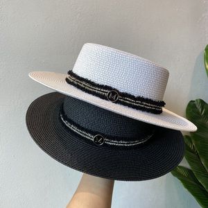 Brittisk vintage svartvit platt topp hatt m brev kvinnors vår och sommar rese skugga solskydd strandhatt semester strå hatt sol hatt