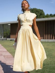 Fritidsklänningar Solid hög midja ihålig för kvinnor Sommar ärmlös klänning Mode Eleganta kläder Semester