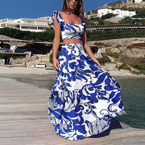 Abito a due pezzi 2022 Summer New Fashion Matching Suit stampato Bohemian Sexy Beach Skirt Suit 2 pezzi Suit Short Top a vita alta da donna lungo T230510