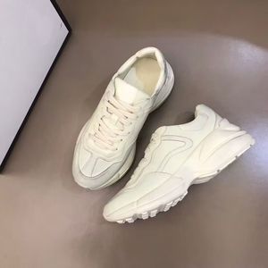 En Lüks Erkekler Rhython Sneakers Erkek Ayakkabı Dana Derisi Düşük Üst Eğitmenler Örgü Nefes Kaykay Yürüyüş Ünlü Marka Runner Parti Elbise Spor EU38-46