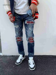 designer dżinsy męskie jean amirres dżinsowe spodnie męskie Trendy Blue Cow Way Hole Made Old Contrast Panel MX1 Elastic Slim Fit Jeans High Street CoU9