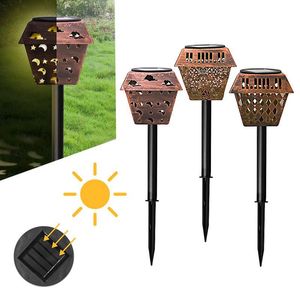 Gräsmattor Ljusa vattenbeständiga lampor Ljus utomhus LED Solar Iron Hollow Decorative Lighting Column Garden Landscape Lantern