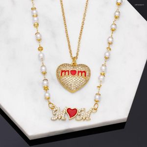 Подвесные ожерелья Flola Red Heart Mom Ожерелье для женщин Медное циркон белый жемчужина романтические украшения из бисера романтической матери.