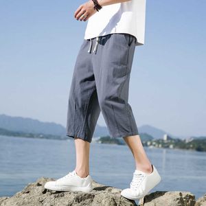 Pantaloni da uomo Pantaloncini da spiaggia Pantaloni da uomo casual estivi in cotone selvaggio e lino sciolto Pantaloni stile coreano Pantaloni dritti a nove punte AA230511